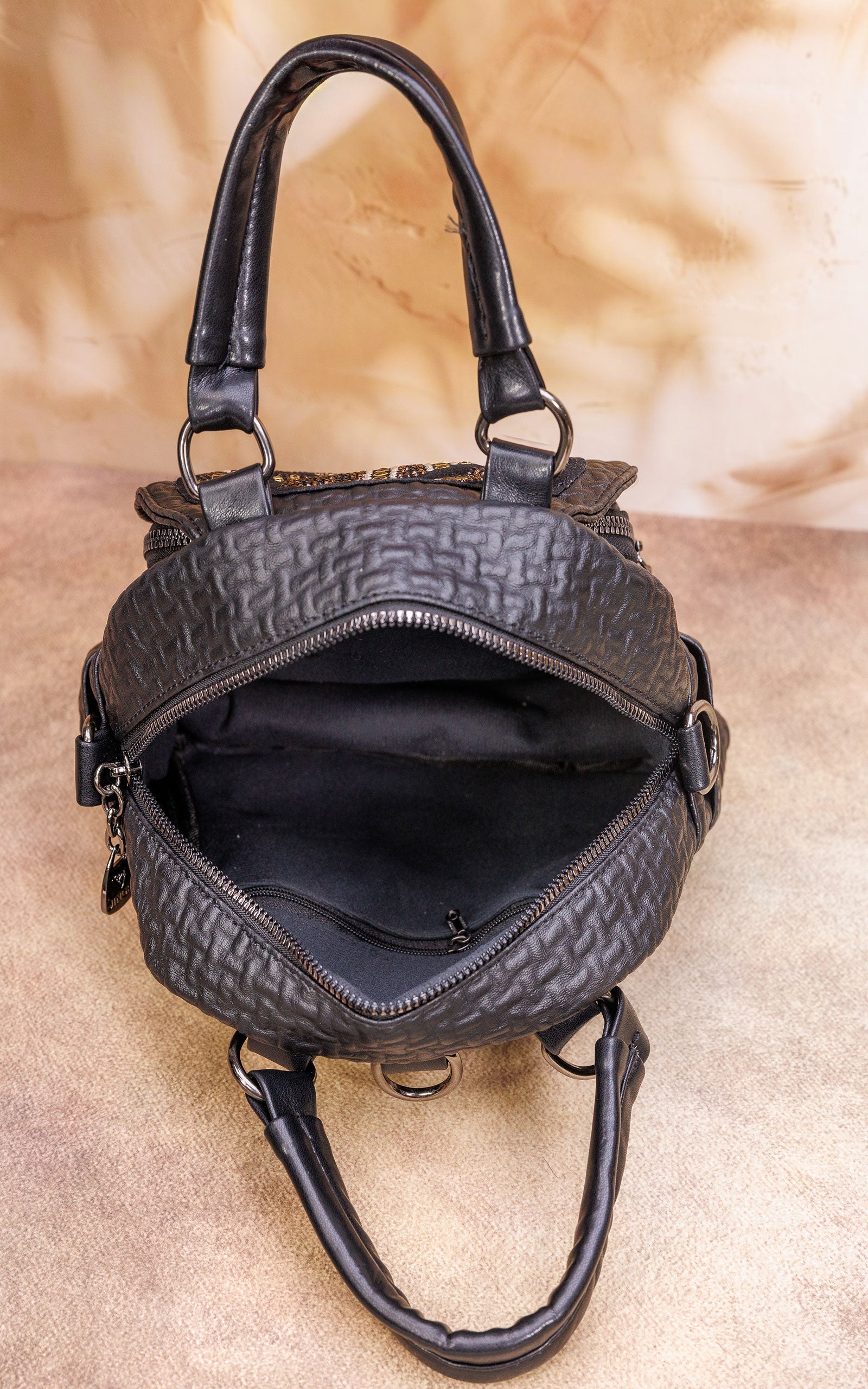 A small handy, stylish backpack bag interior