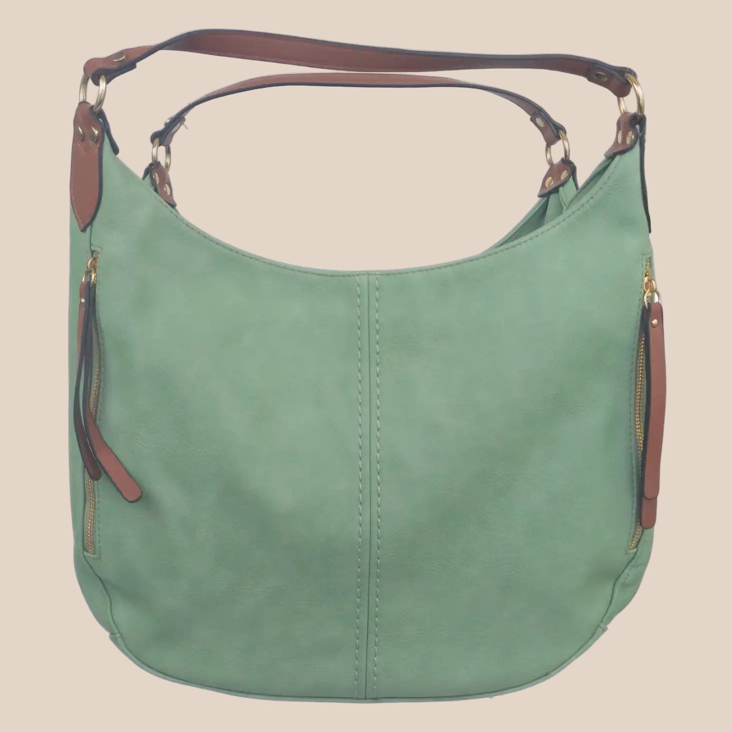 Green handbag with brown accents on a beige background front