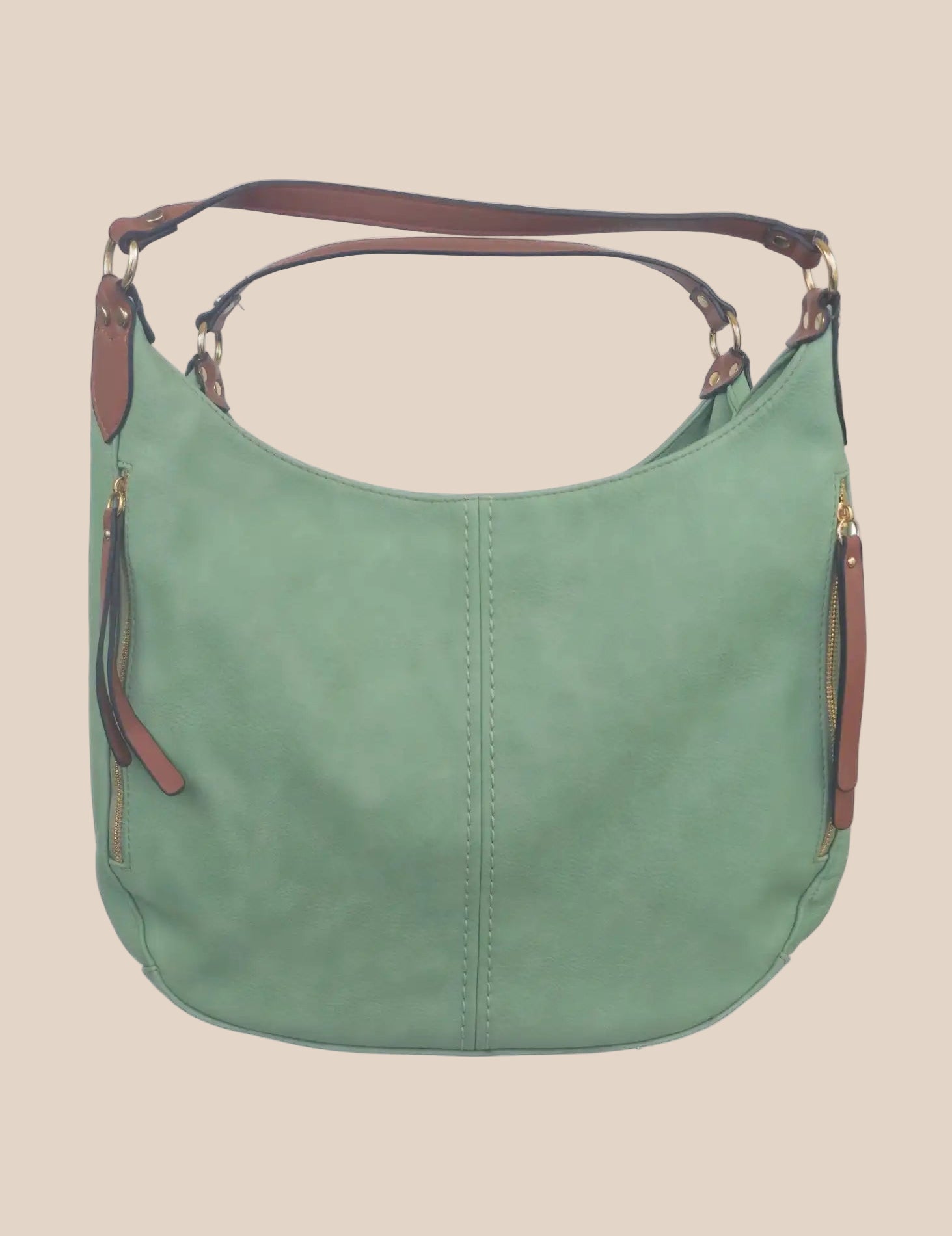 Green handbag with brown accents on a beige background front