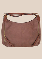 Brown handbag with gold zippers on a beige background front