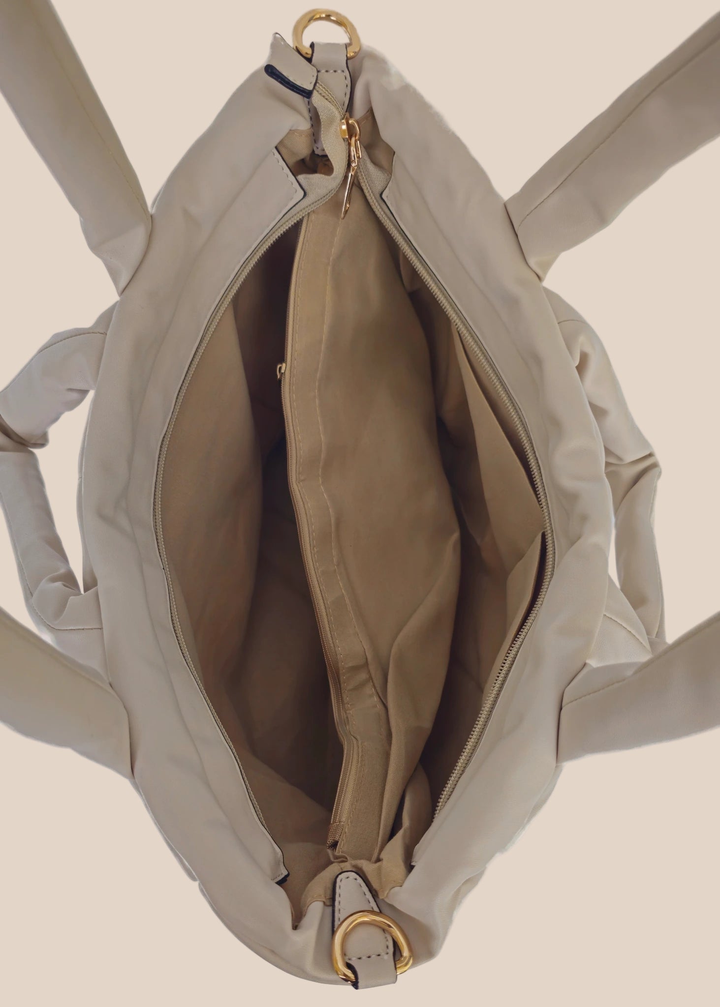 Light Gray smooth form handbag with a strap and handles interior view