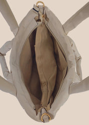 Light Gray smooth form handbag with a strap and handles interior view