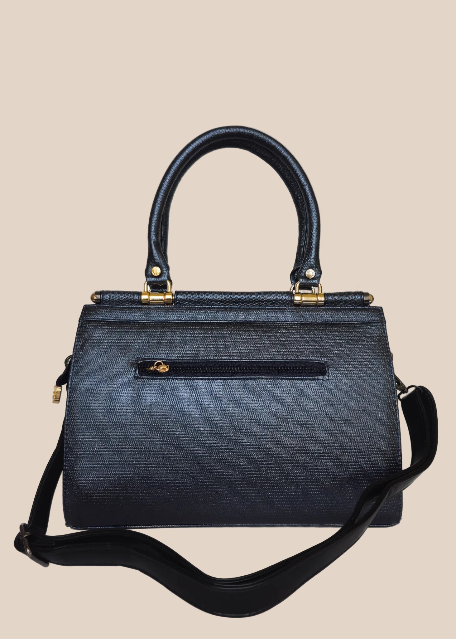 Black handbag with gold accents back view