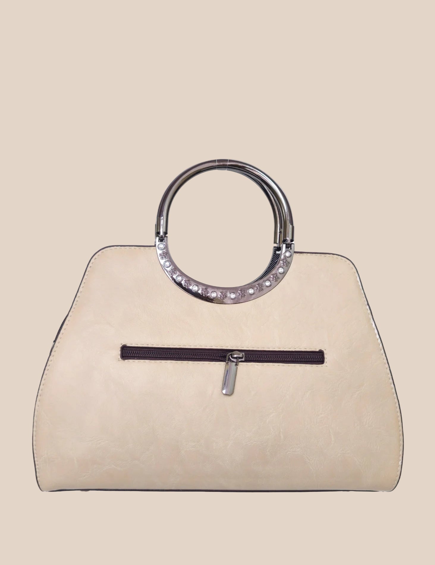 Light moca brown handbag with a floral tooled design back view