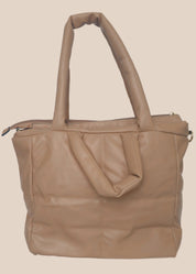 Brown smooth form handbag with a strap and handles back view