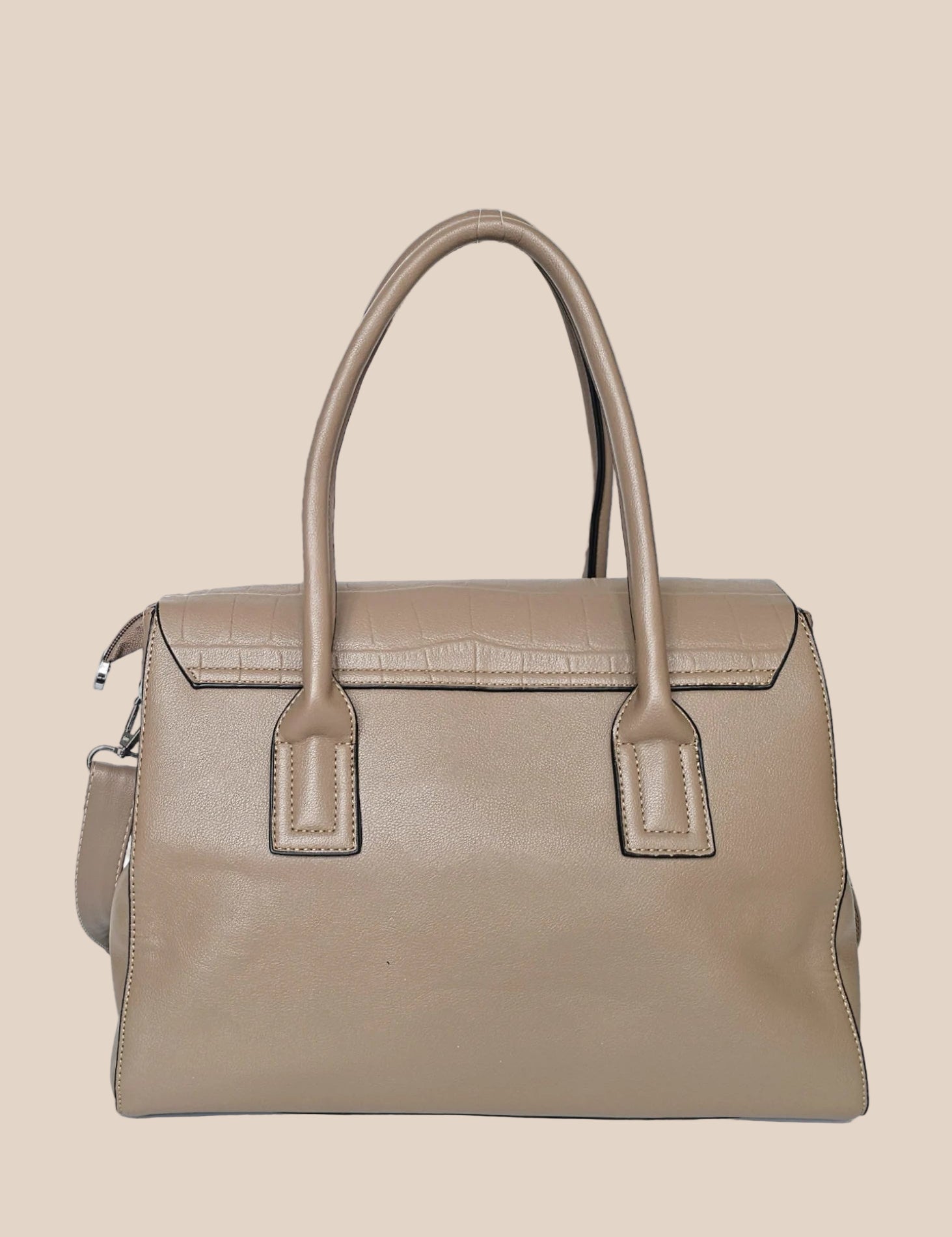 Beige PU ladies handbag with a front strap back view
