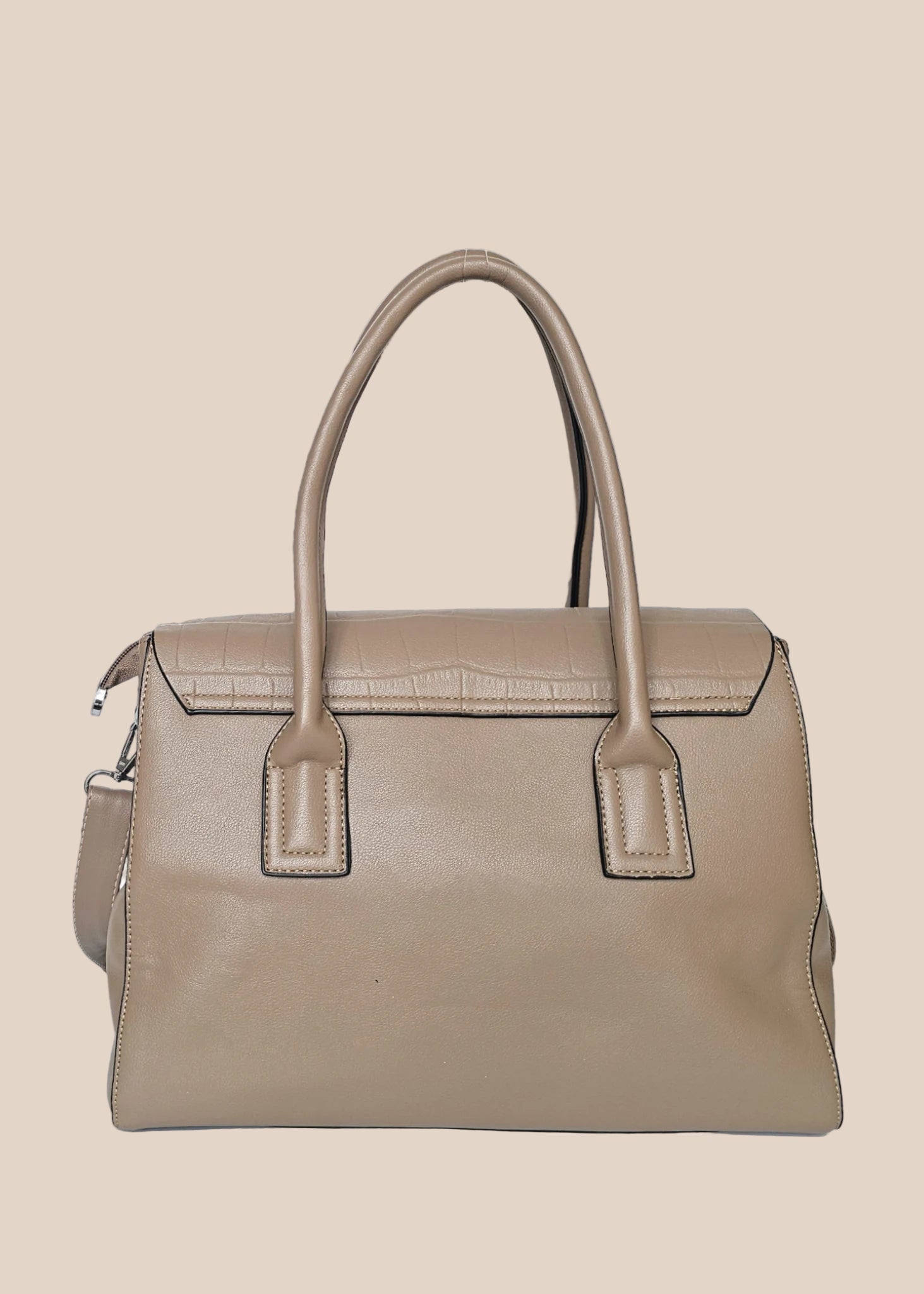 Beige PU ladies handbag with a front strap back view