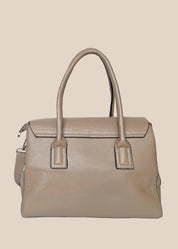 Beige PU ladies handbag with a front strap back view