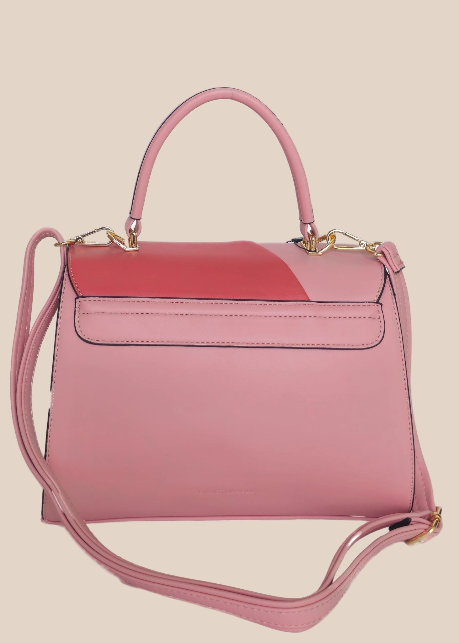 Pink and red handbag with a gold clasp back view
