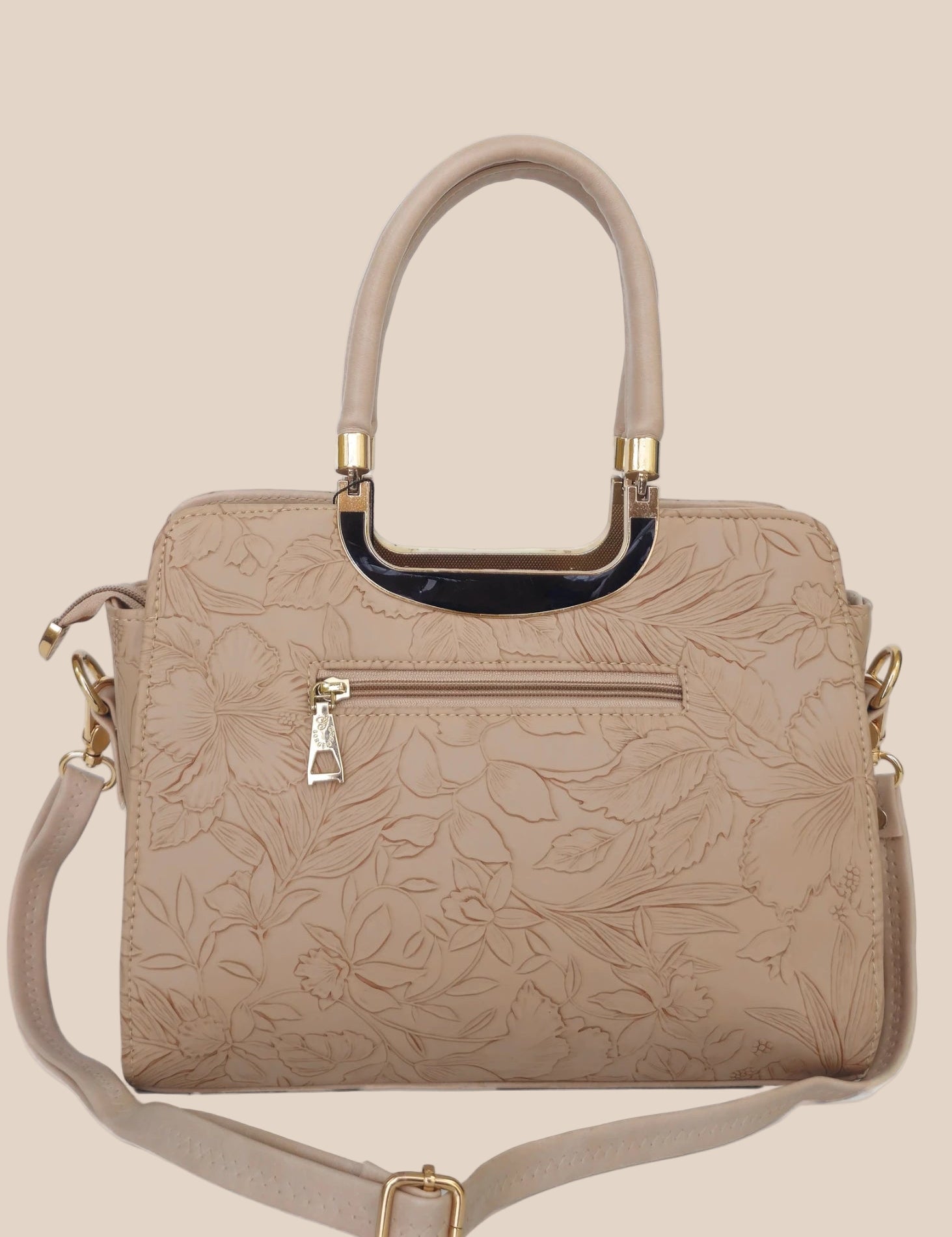 Beige handbag with a floral pattern and a gold handle back view