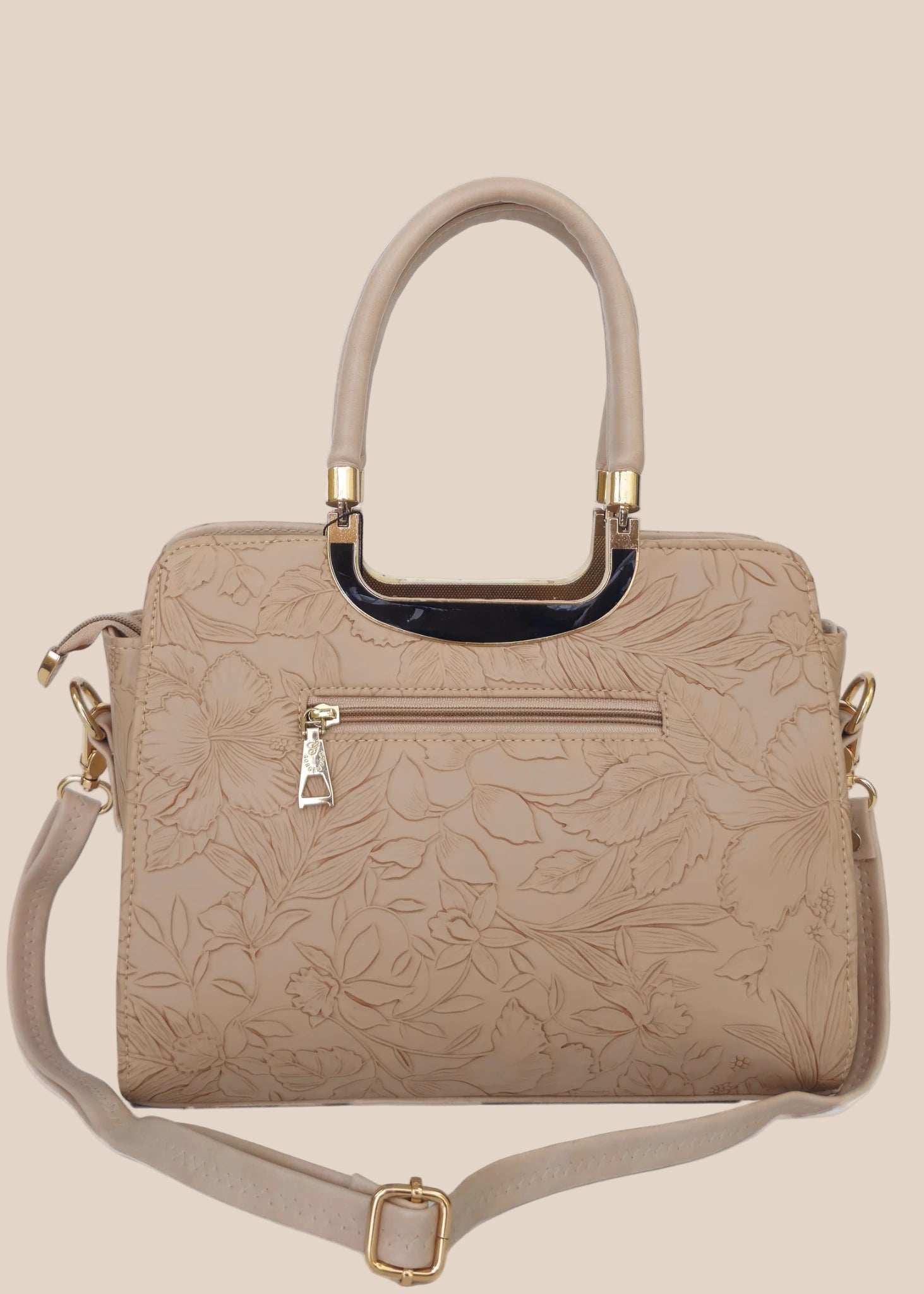 Beige handbag with a floral pattern and a gold handle back view