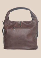 Brown leather handbag with a tassel on a beige background back view