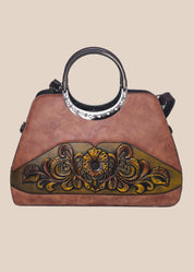 Dark mouve party handbag with floral embossing, front view