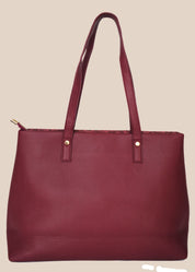Burugundy floral-patterned handbag with a gold zipper back view
