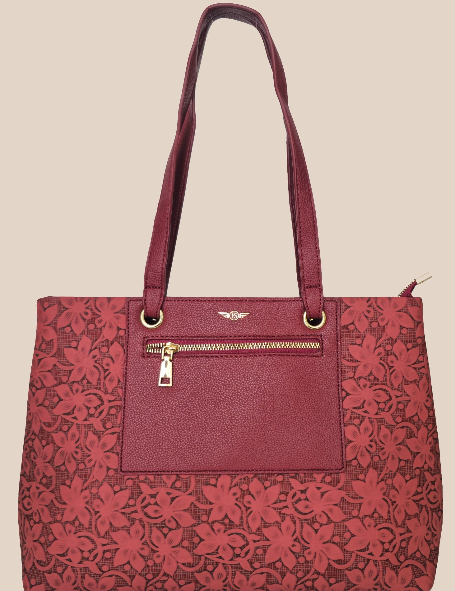 Burugundy floral-patterned handbag with a gold zipper front view