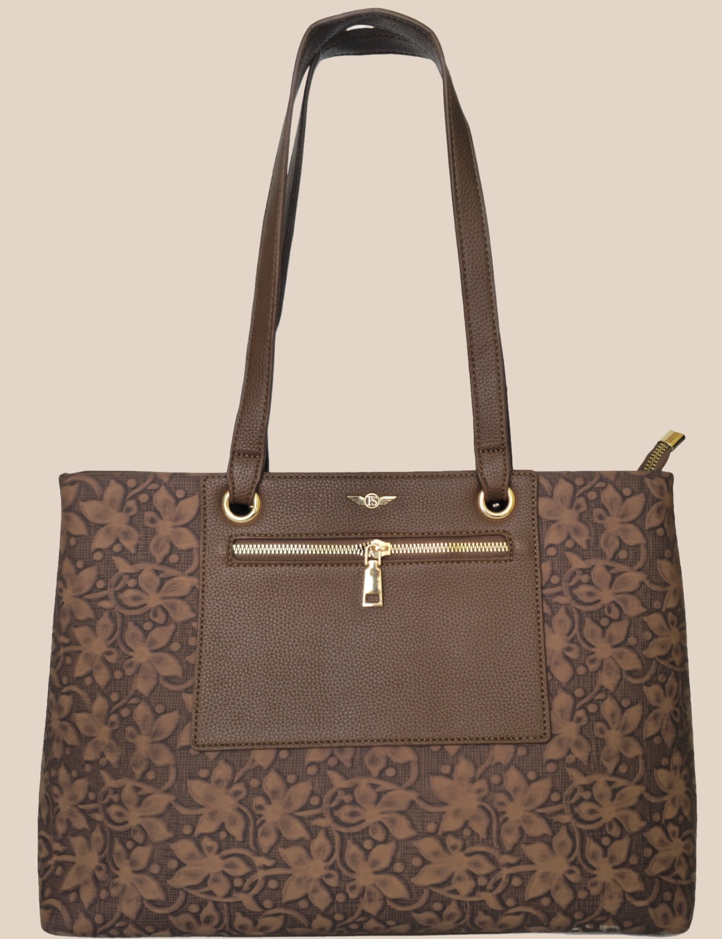 Tan floral-patterned handbag with a gold zipper front view