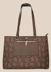 Tan floral-patterned handbag with a gold zipper front view