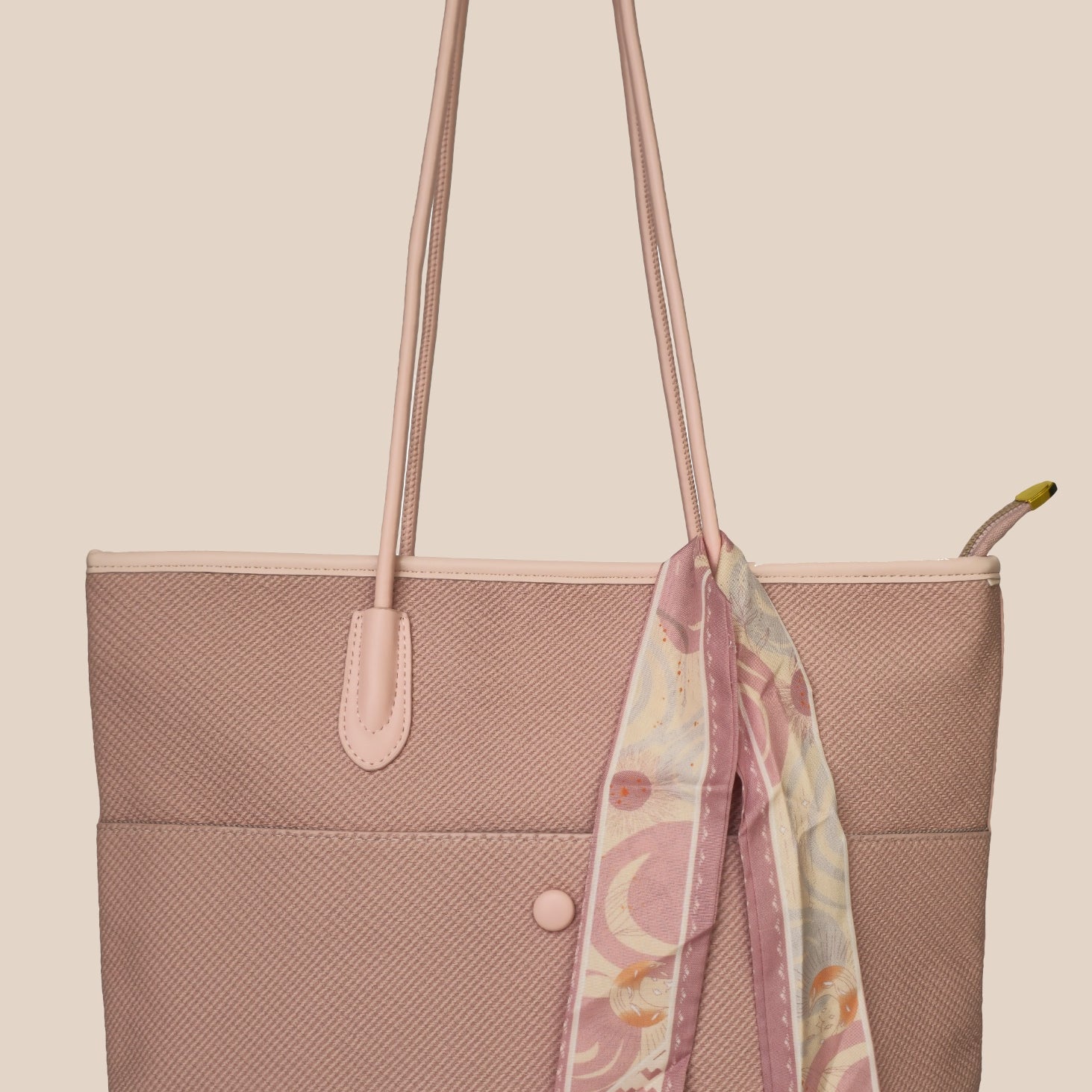 Dusty Pink tote bag with a floral scarf draped over it front view