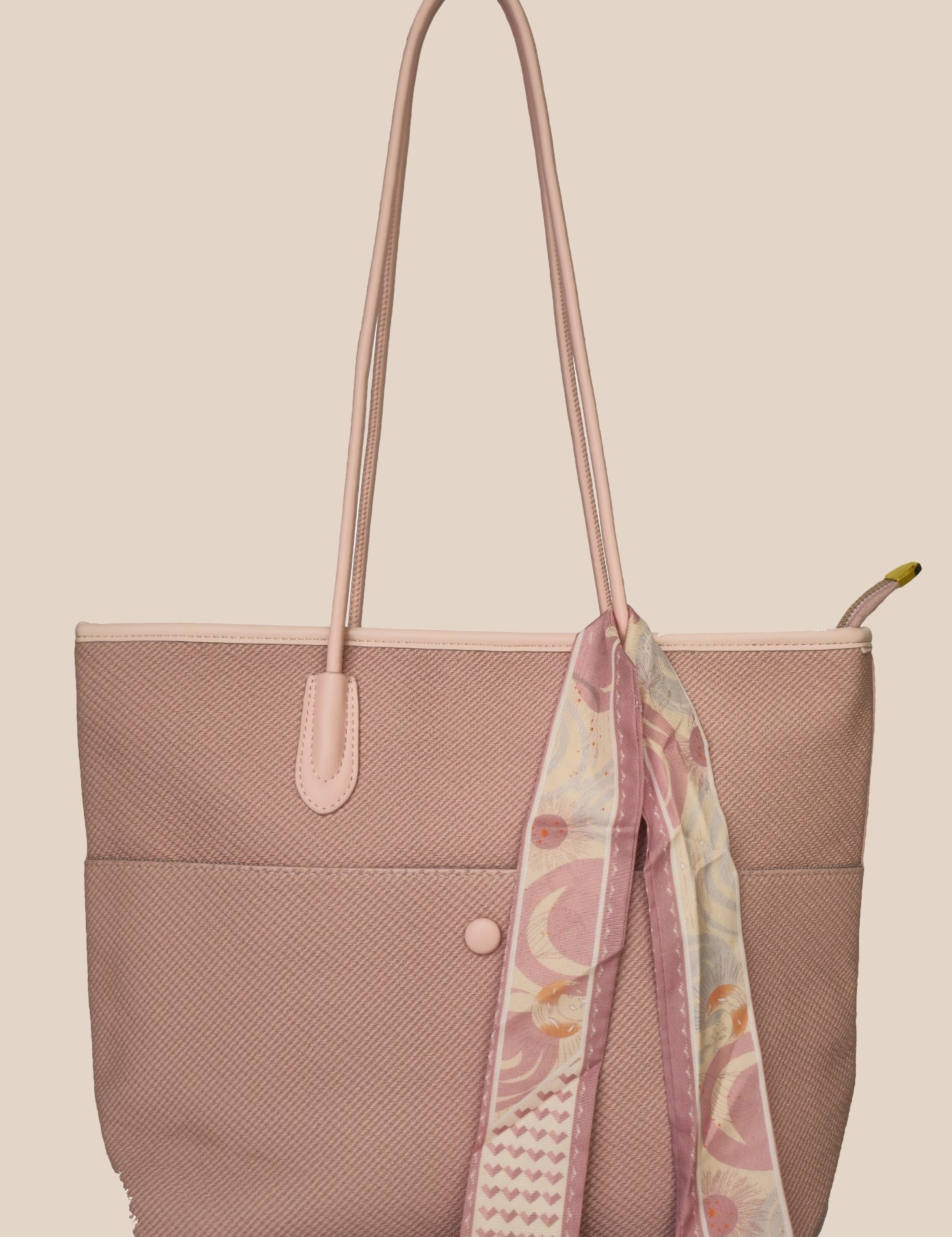 Dusty Pink tote bag with a floral scarf draped over it front view