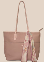 Dusty Pink tote bag with a floral scarf draped over it front view