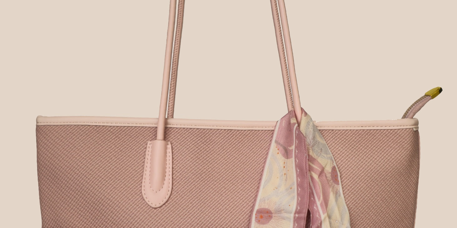 Dusty Pink tote bag with a floral scarf draped over it front view