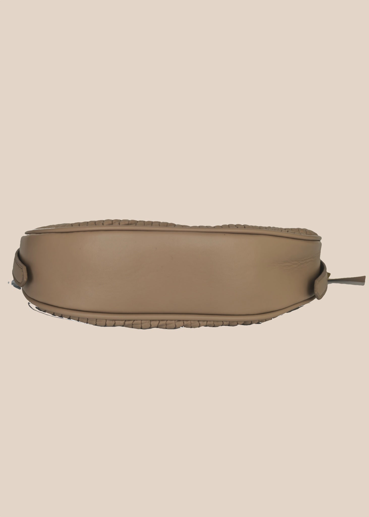 Brown textured small handbag with a zipper base view