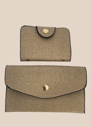 Two beige textured pouches with gold buttons