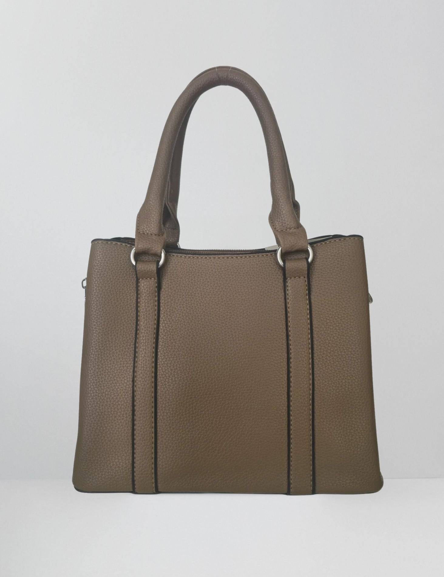 Brown handbag on a light gray background