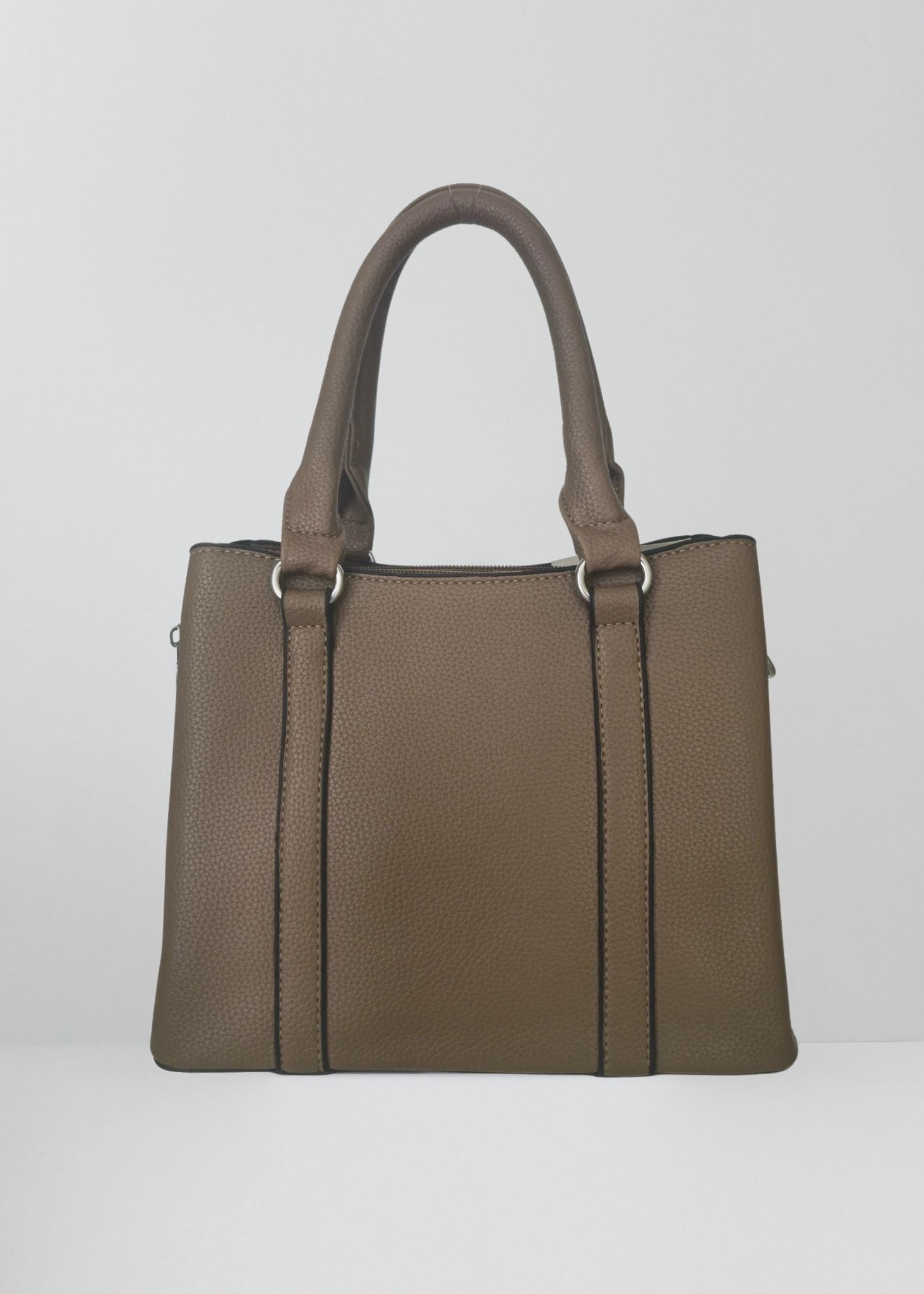Brown handbag on a light gray background