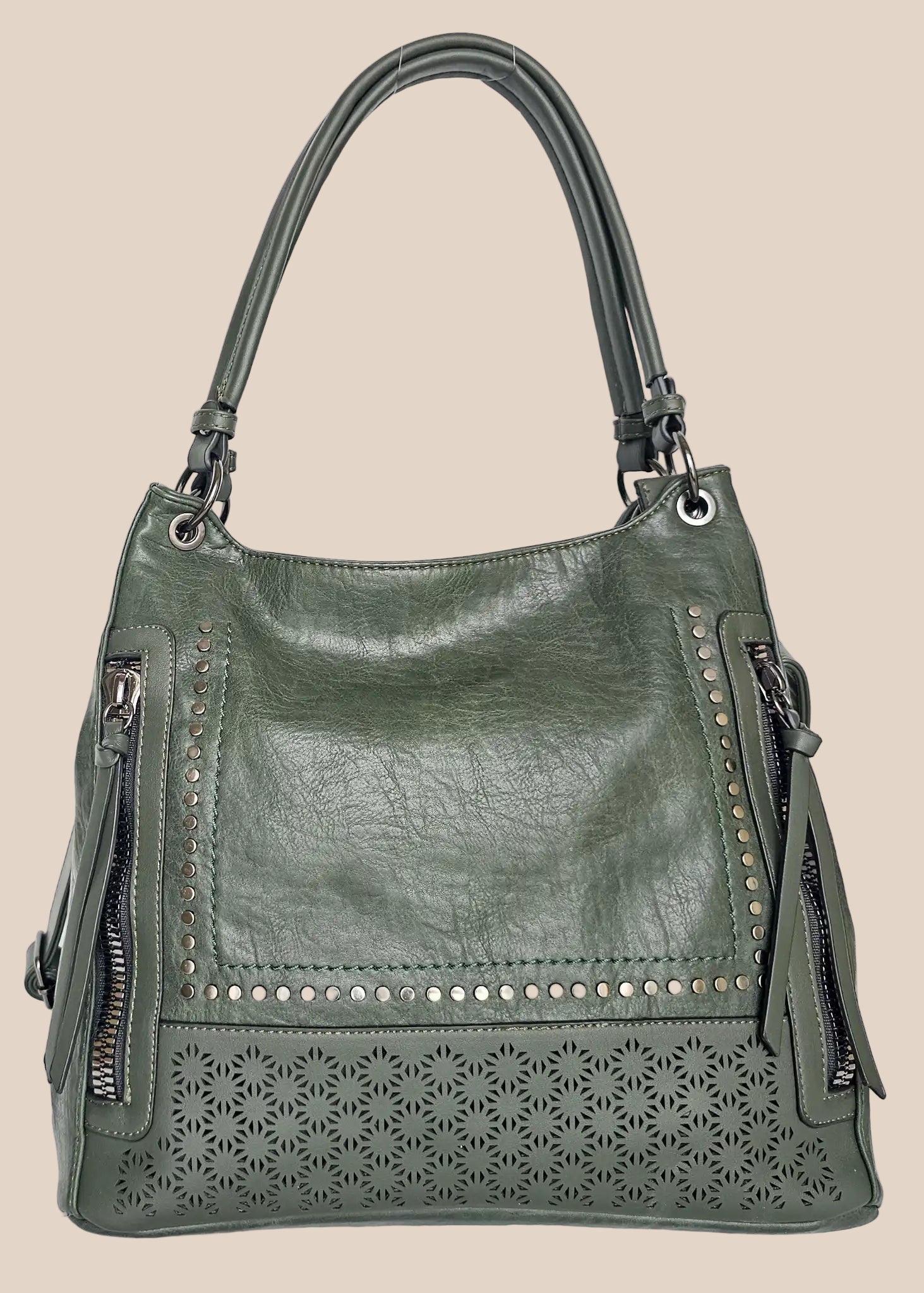 Green handbag with decorative studs and cut-out patterns front view