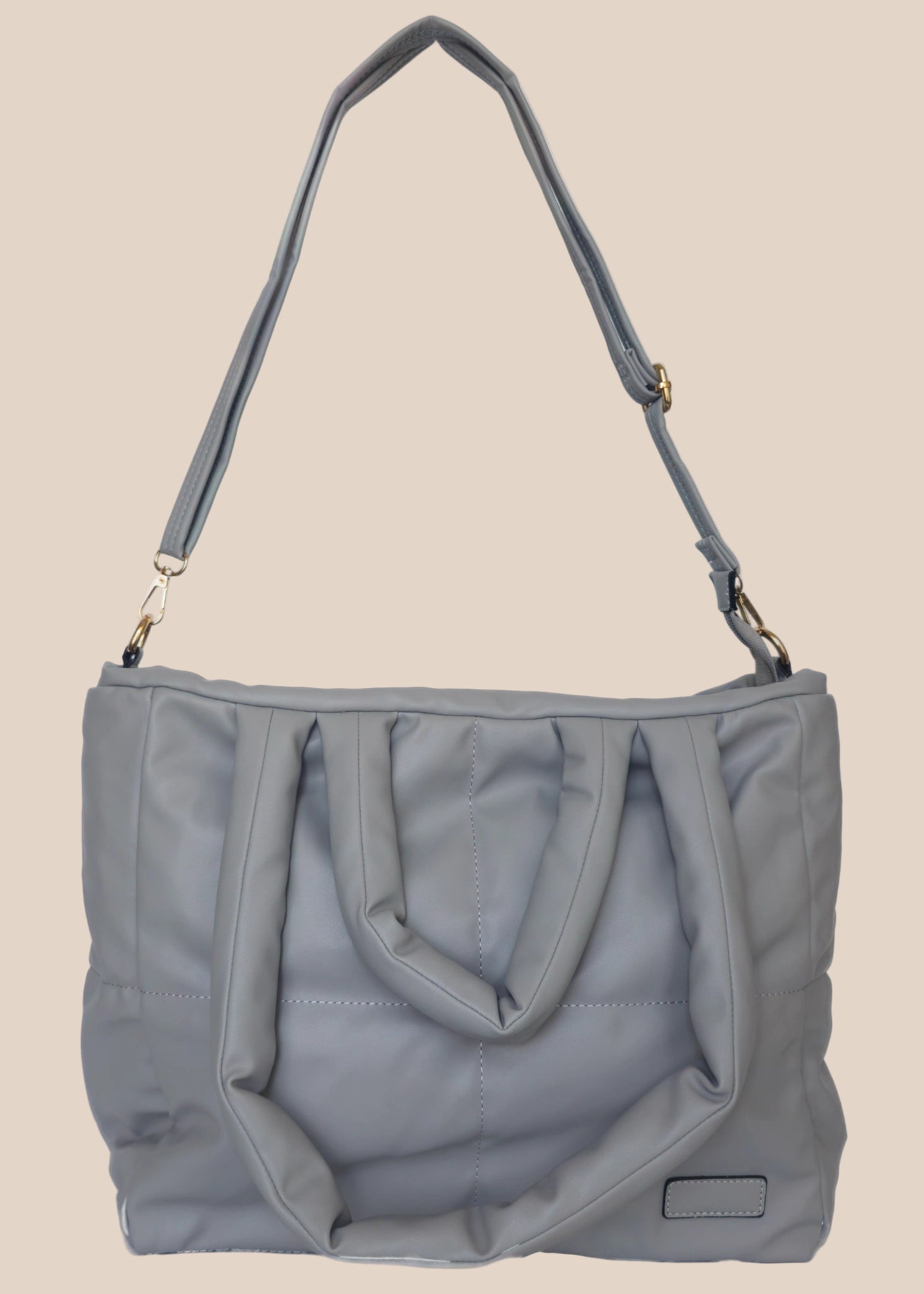 Gray smooth form handbag with a strap and handles front view