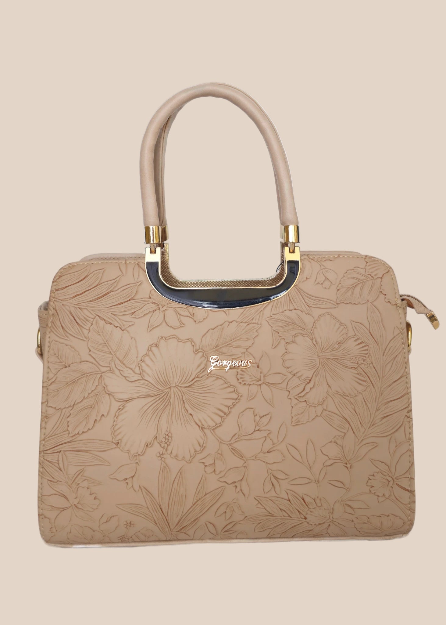 Beige handbag with a floral pattern and a gold handle front view