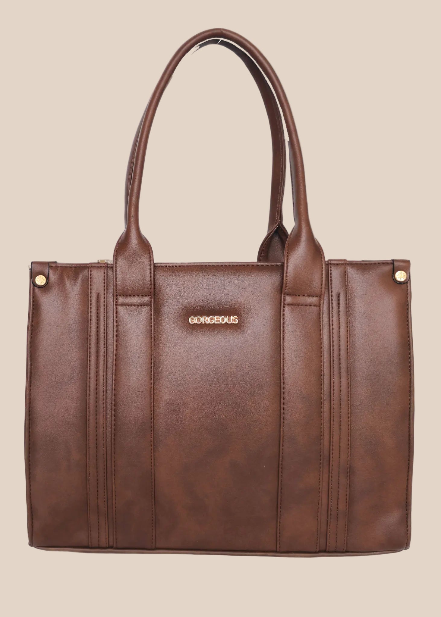 Brown leather tote bag with 'GORGEOUS' branding from doodluxe