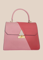 Pink and red handbag with a gold clasp, front view