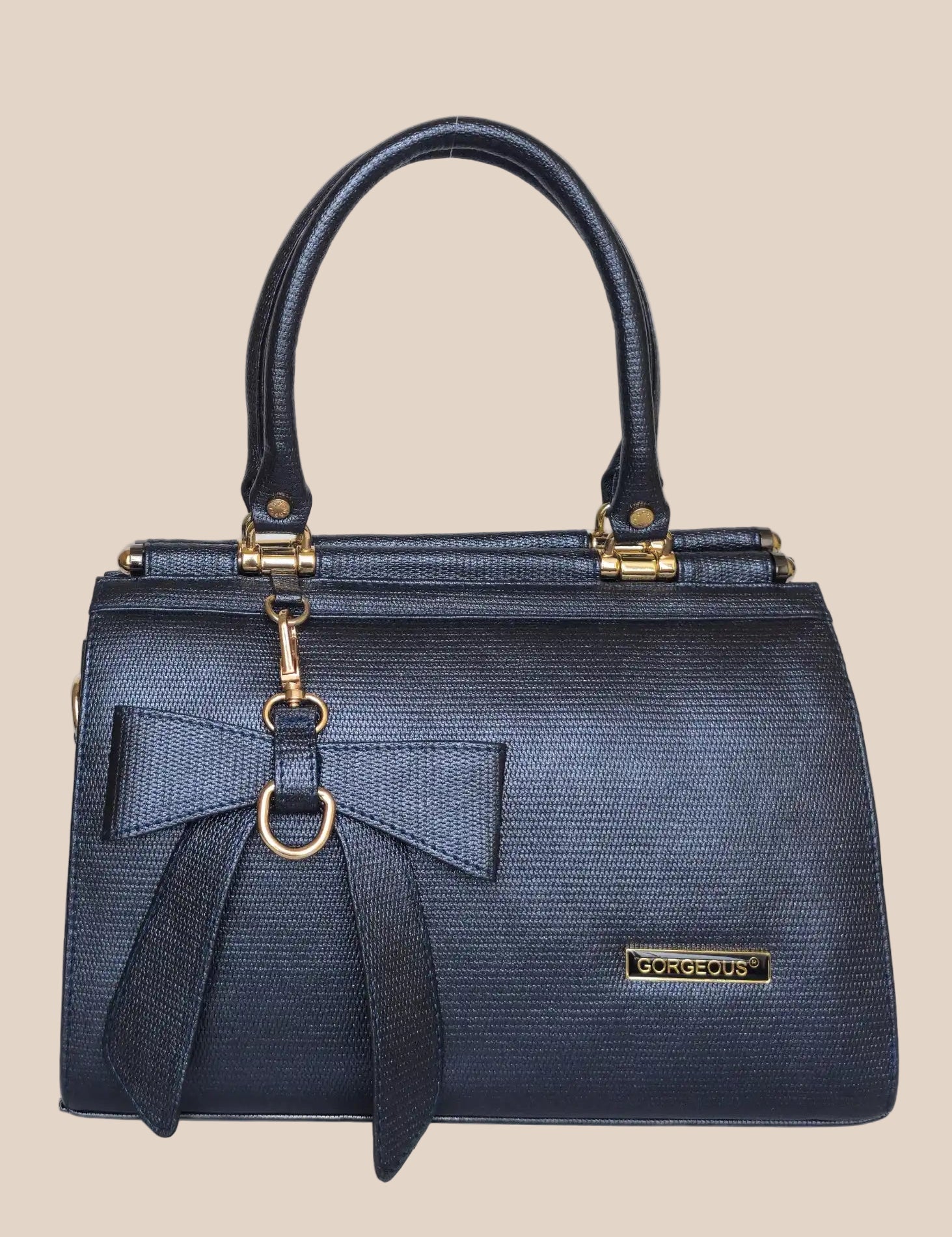 Blue handbag with a bow detail front view