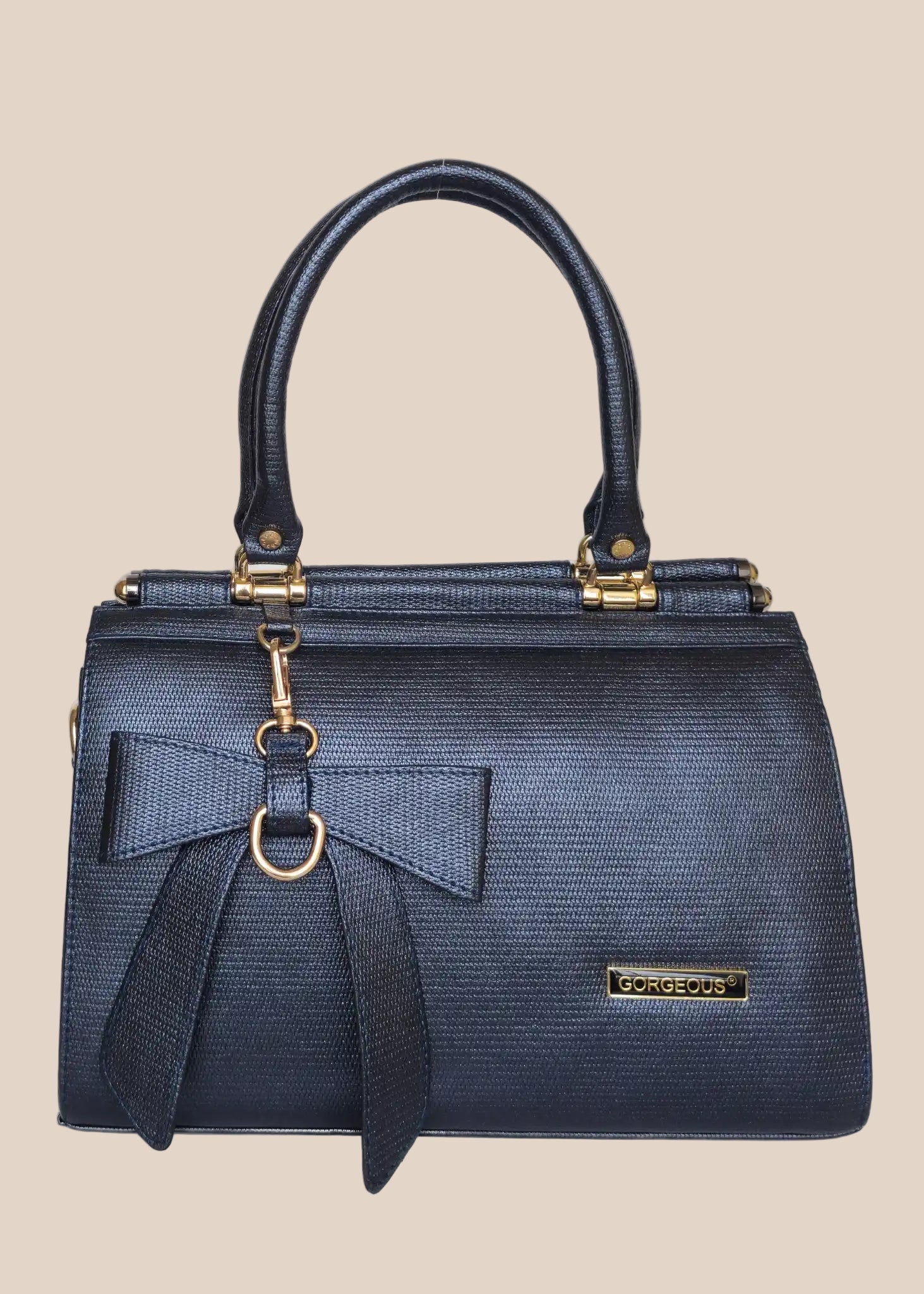 Blue handbag with a bow detail front view
