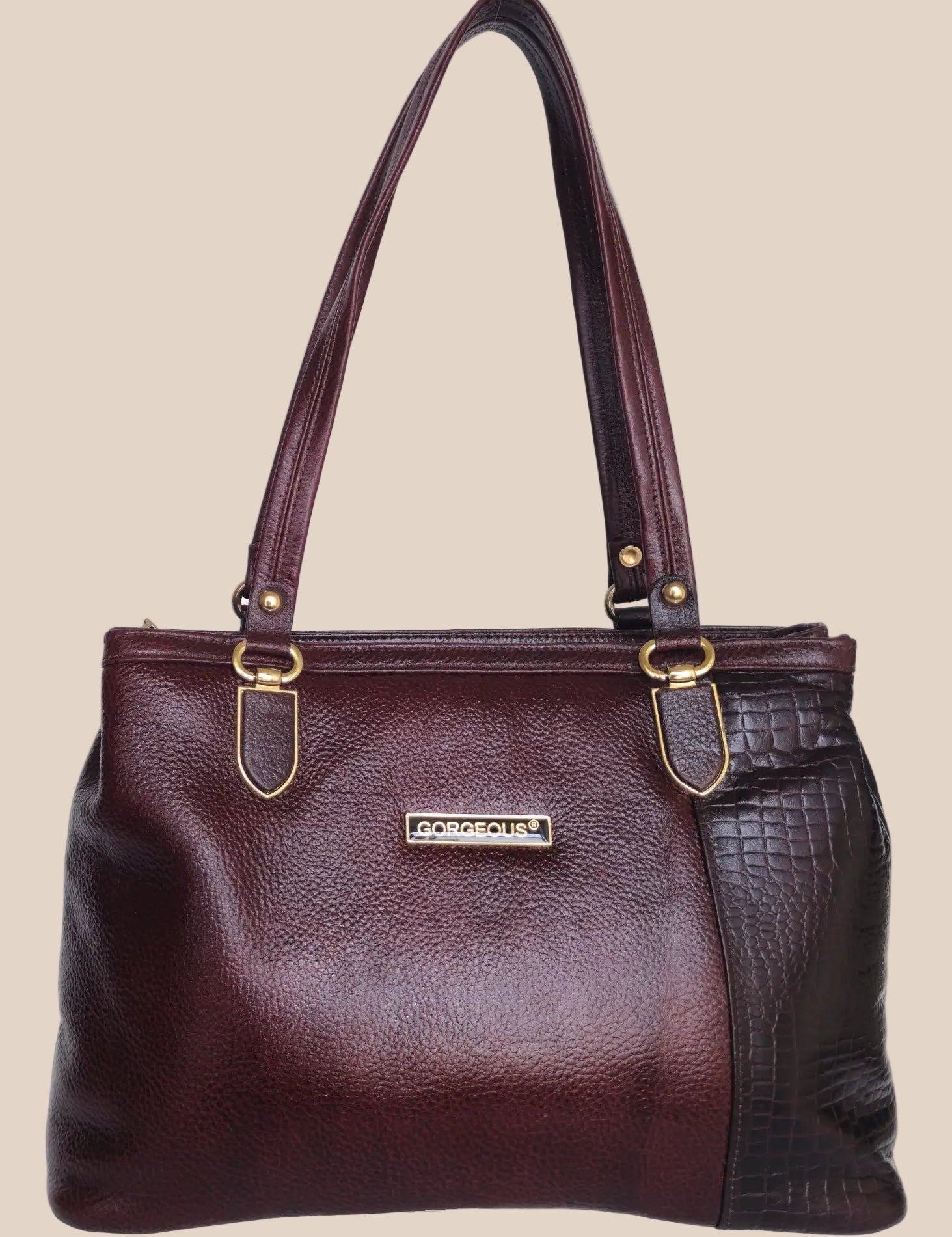 Burugundy leather handbag with gold accents
