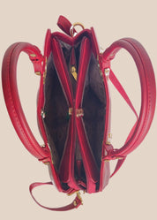 Dusty pink handbag with gold accents interior view