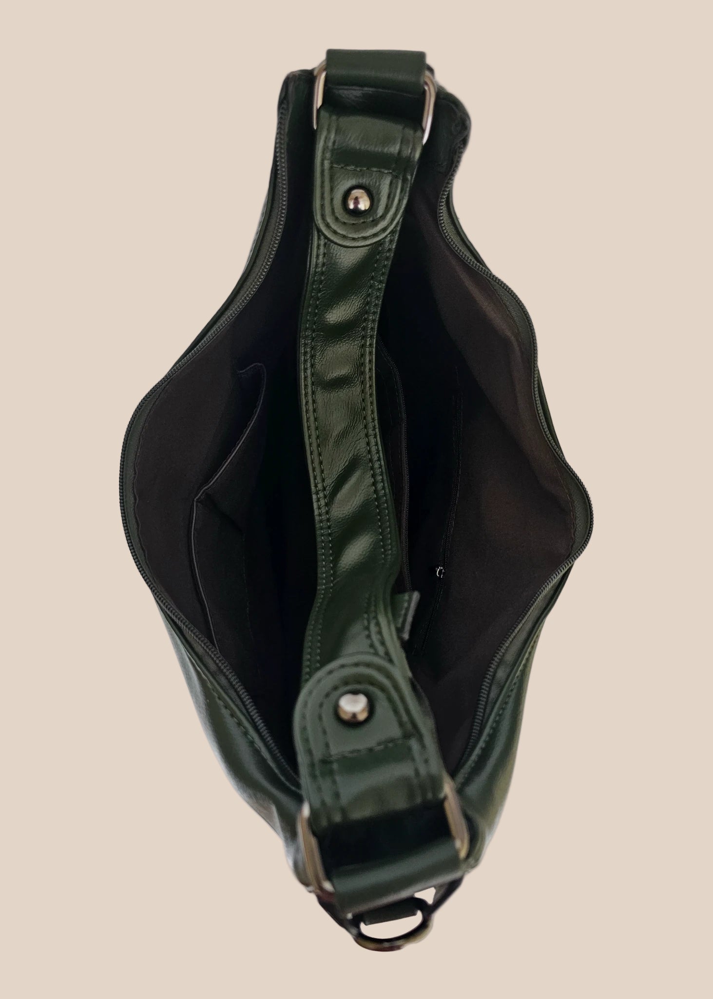 Green handbag with studded details inside view