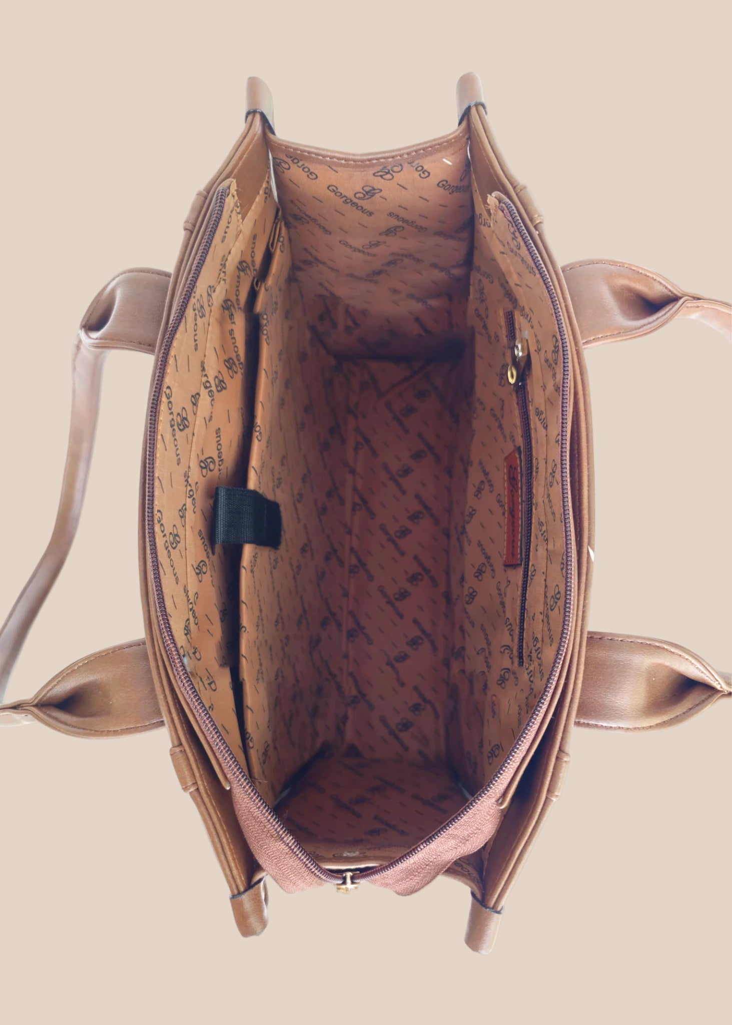 Brown leather tote bag with 'GORGEOUS' branding from doodluxe inside view