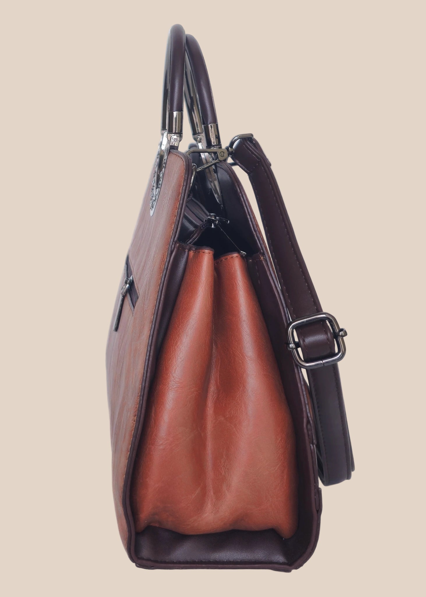 Dark mouve party handbag with floral embossing, side view