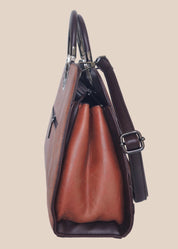 Dark mouve party handbag with floral embossing, side view