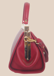 Deep berry party handbag side view