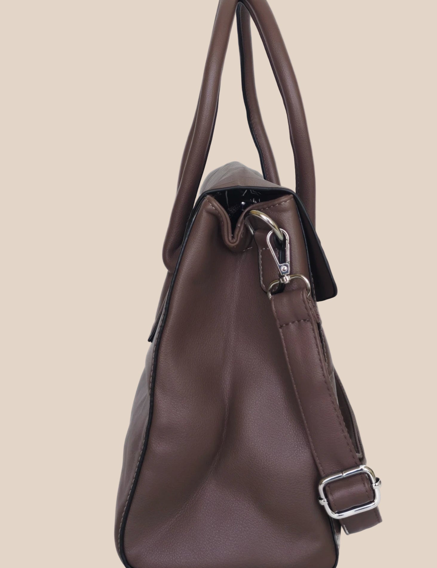 Brown crocodile-patterned ladies' handbag with a shoulder strap side