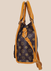 Handbag with a star pattern and a brown handle side view