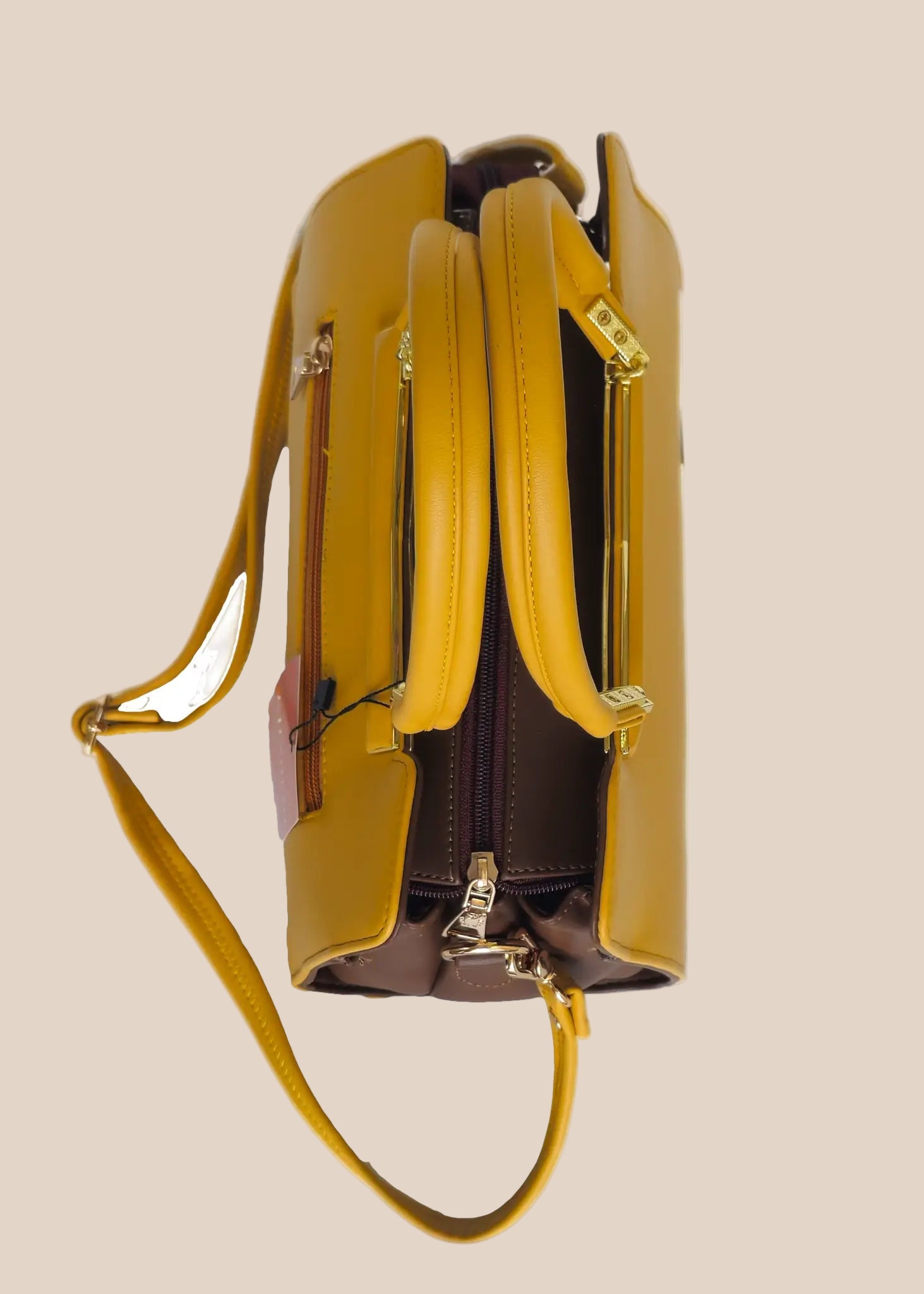Yellow handbag with a strap top view