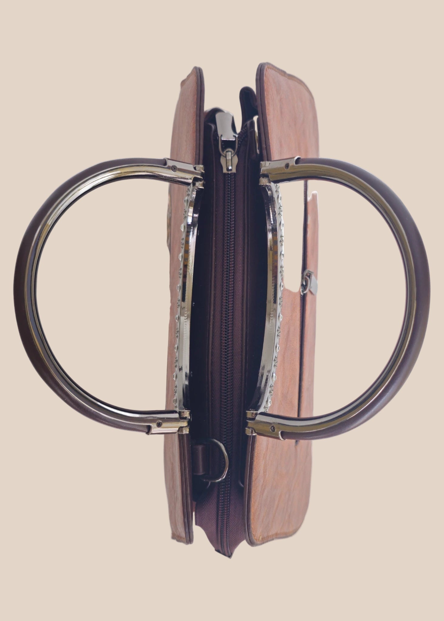 Dark mouve party handbag with floral embossing, top view