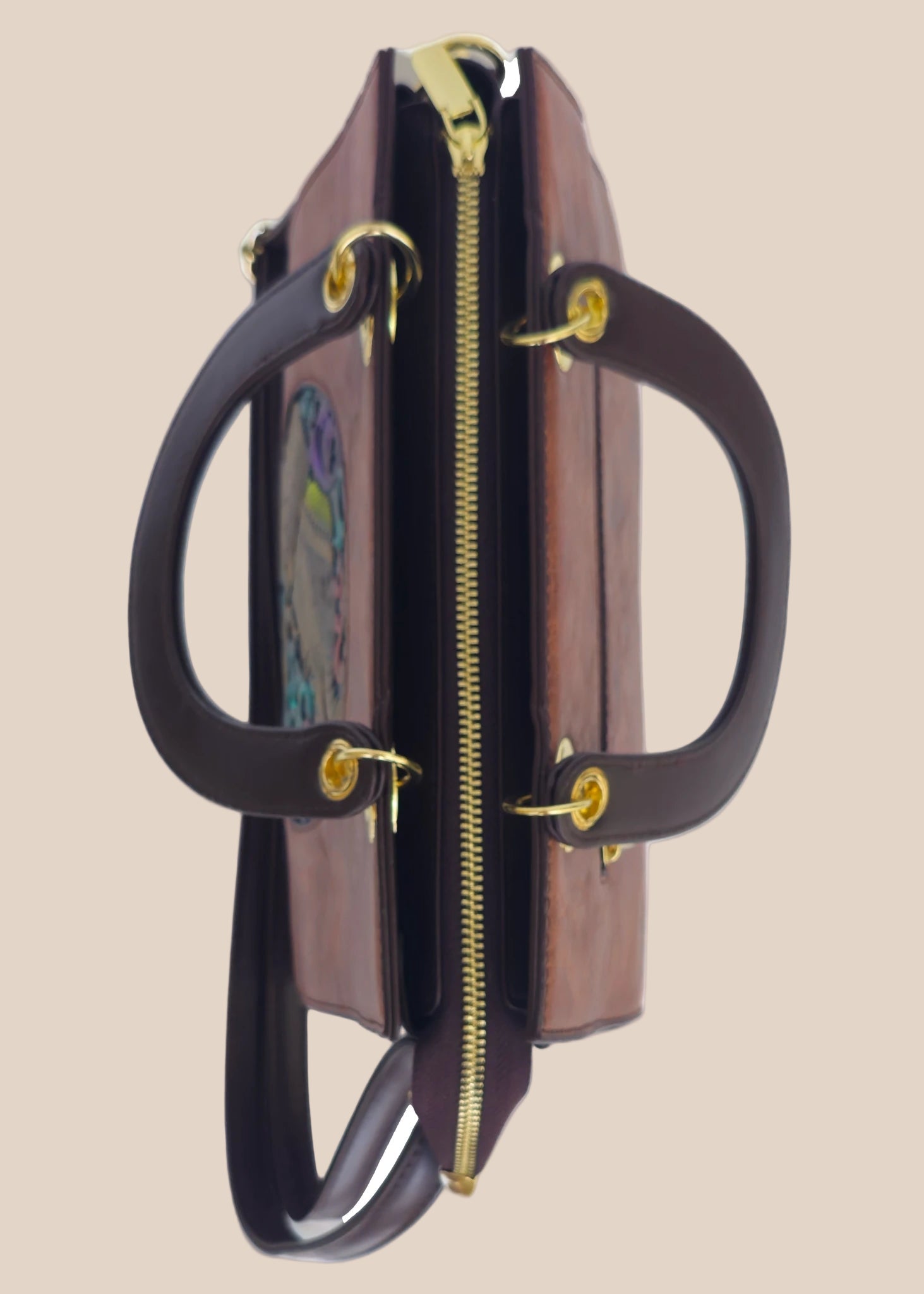 Brown party handbag with a colourful art top view