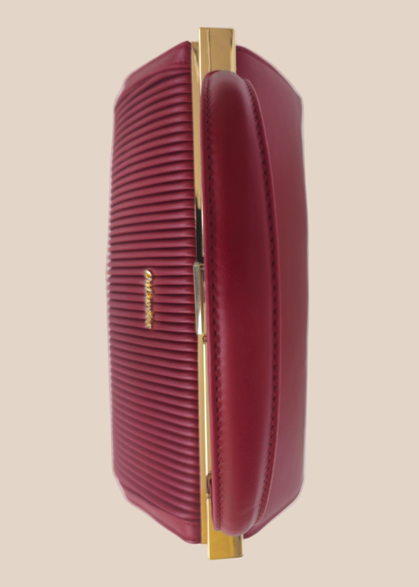 Deep berry party handbag top view