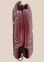 Dusty pink handbag with gold accents top view